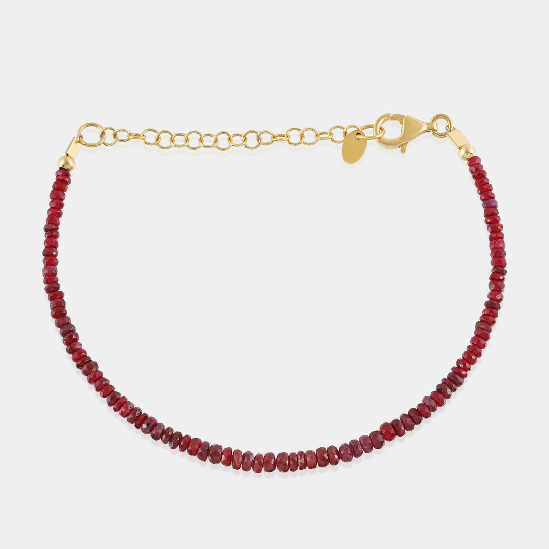 faceted rondelle ruby beads on the bracelet