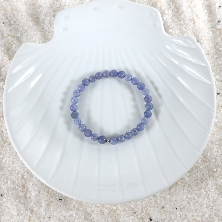 Tanzanite Stretch Bracelet beautifully displayed, demonstrating its beads stretchable design and appealing aesthetic