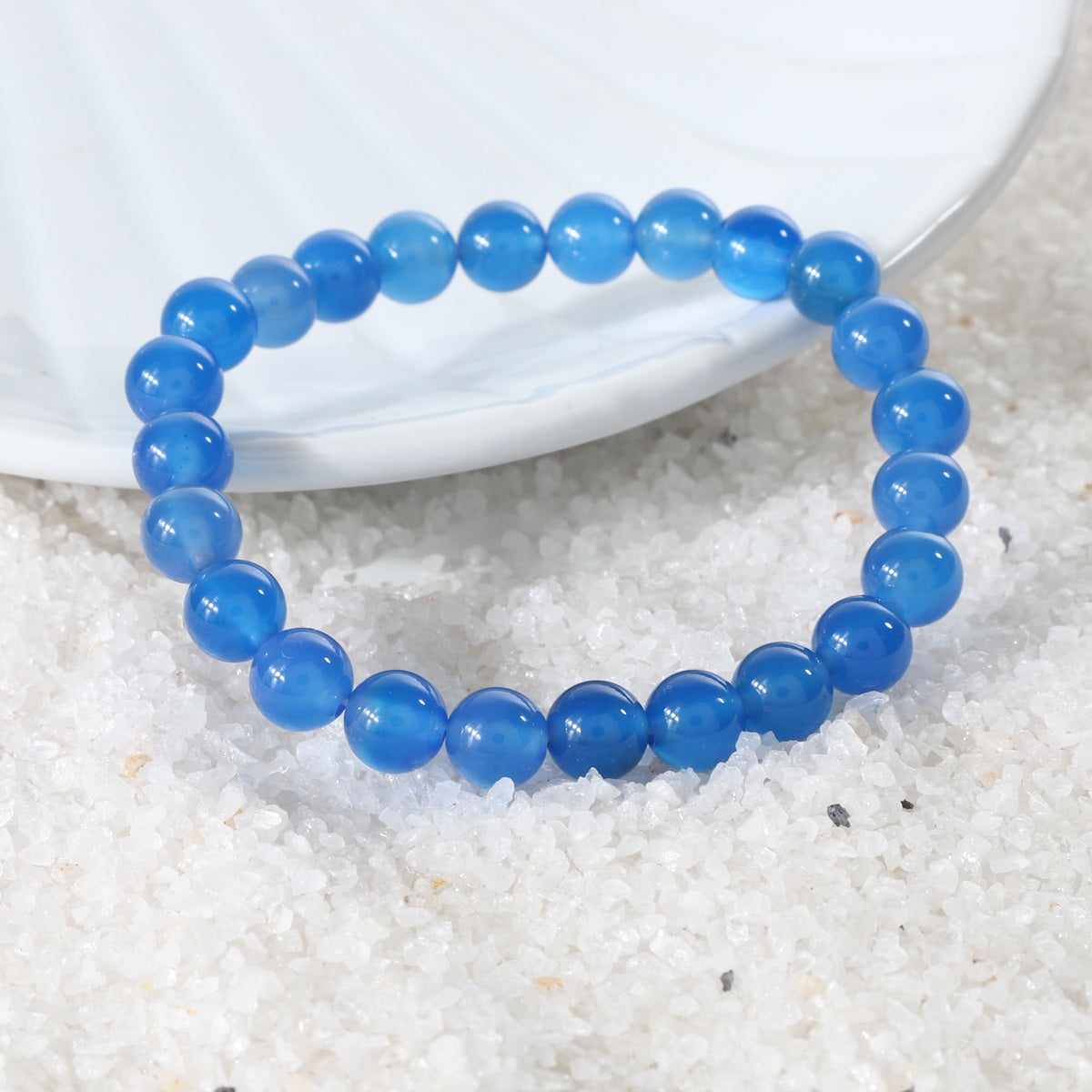 Natural Blue Onyx Bracelet showcasing the beauty and elegance of the gemstone, empowering the wearer.