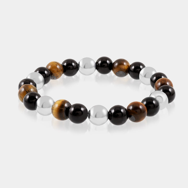 A collection of Triple Protection Stretch Bracelets, each uniquely combining Golden Tiger's Eye, Black Onyx, and Hematite for a trifecta of protective energies