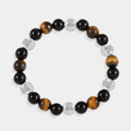 Stylish Triple Protection Stretch Bracelet featuring 6mm and 8mm smooth round beads of Golden Tiger's Eye, Black Onyx, and Hematite