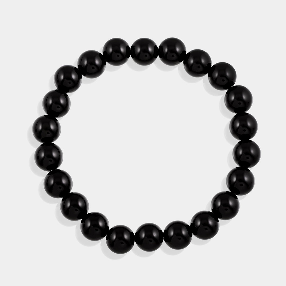 Elegant Black Onyx Bracelet with 6mm and 8mm smooth round stones, radiating strength and grounding energy