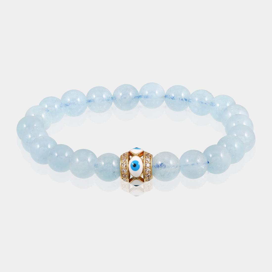 Close-up of smooth round Aquamarine gemstone beads in serene blue color.