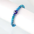 An intricate Evil Eye bead, a protective symbol against negativity, adding a touch of positive energy and safeguarding intent.