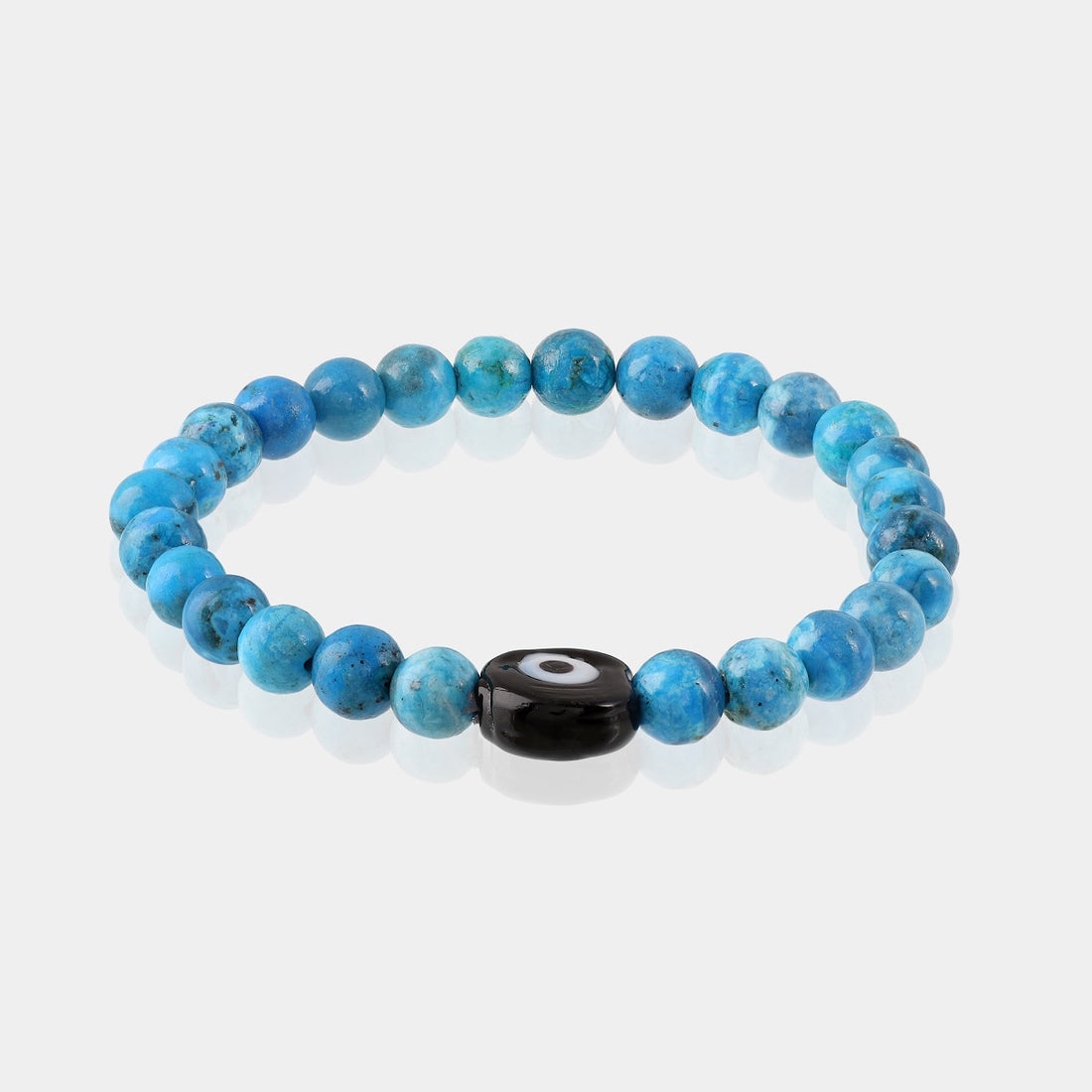 A bracelet adorned with smooth round Turquoise gemstone beads, showcasing a calming blue hue reminiscent of the sky and sea.