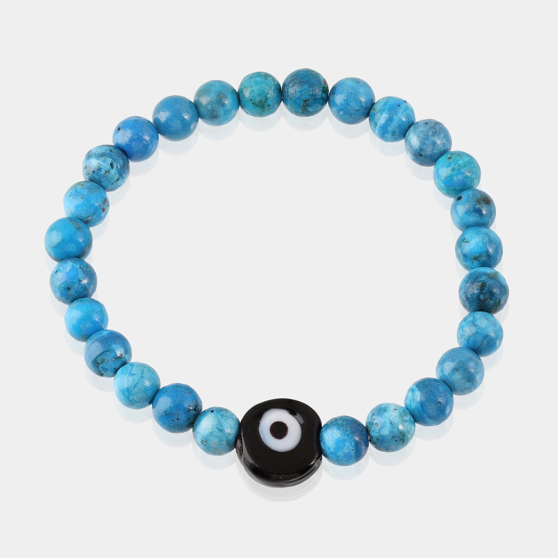 A bracelet adorned with smooth round Turquoise gemstone beads, showcasing a calming blue hue reminiscent of the sky and sea.