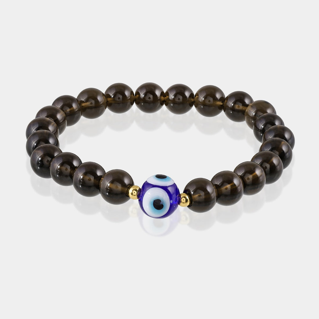 Close-up of smooth round Smoky Quartz gemstone beads in a captivating smoky hue.