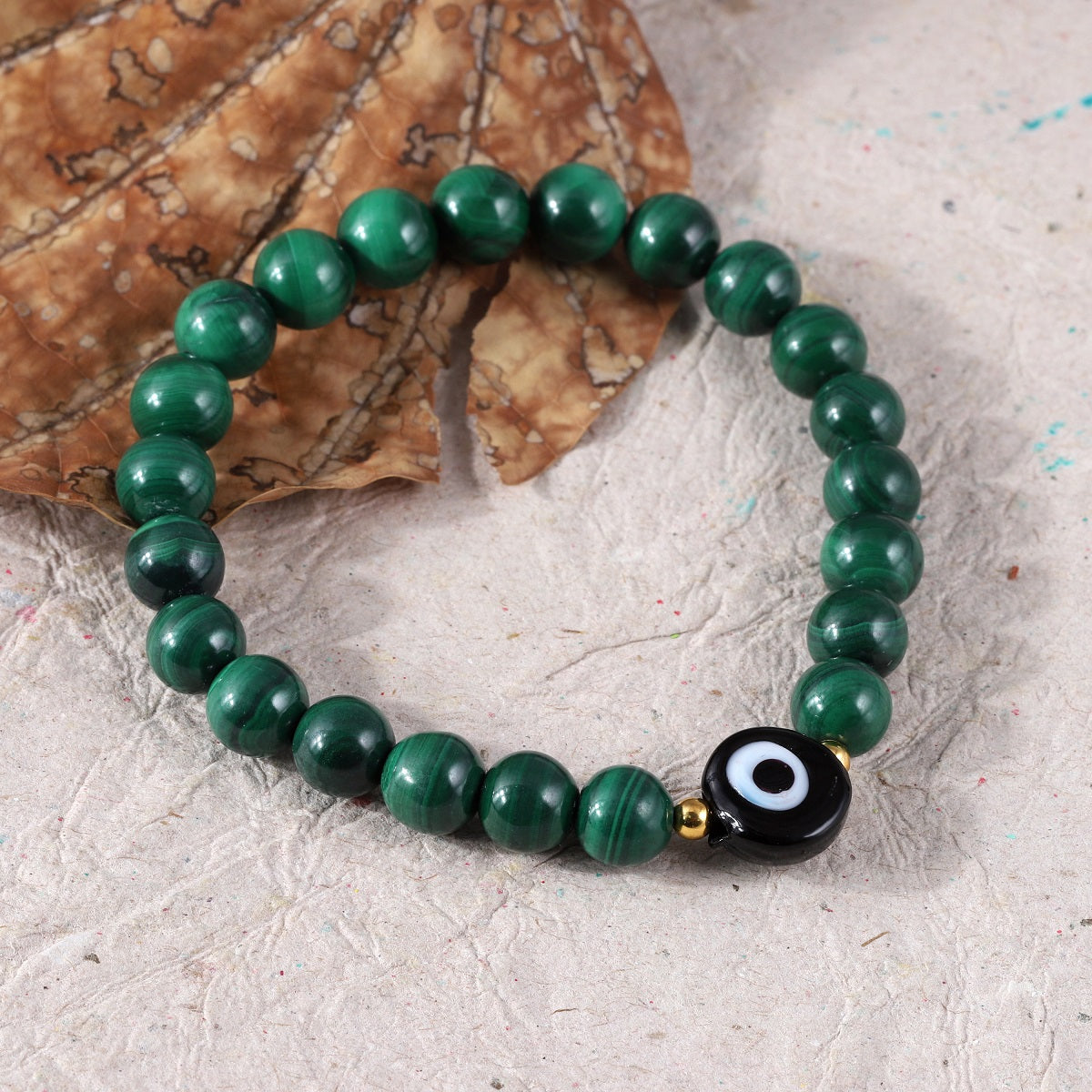 An assortment of beautifully handcrafted Friendship Bracelets, each featuring unique gemstone combinations.