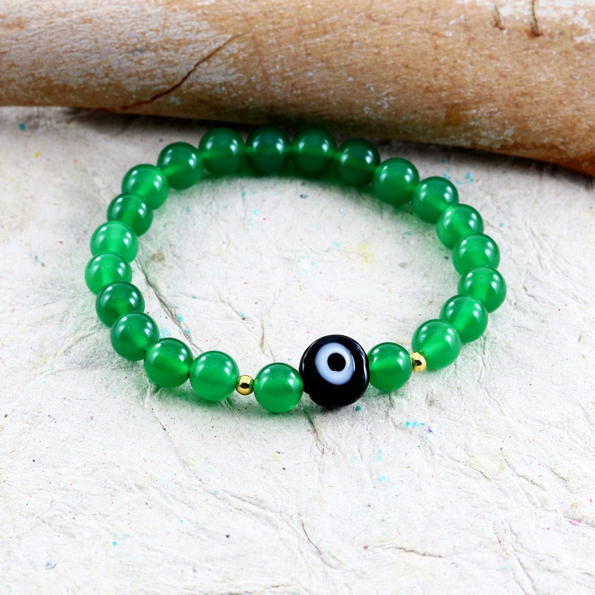 Friendship bracelet showcasing the blend of Green Onyx and Hematite beads on a stretchable cord.
