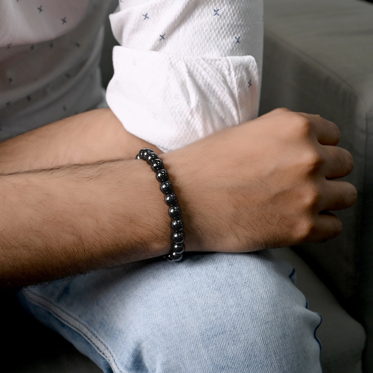 Black Hematite Stretch Bracelet: Smooth round 8mm beads in captivating black hue.