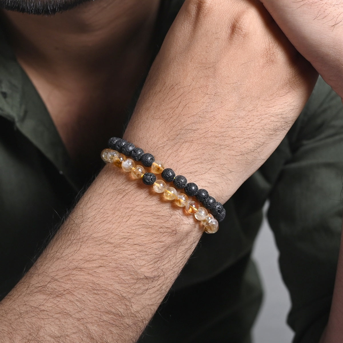 Natural Citrine & Lava Gemstone Bracelet Combo, highlighting the exquisite 6mm beads on his wrist for a sophisticated and trendy look.