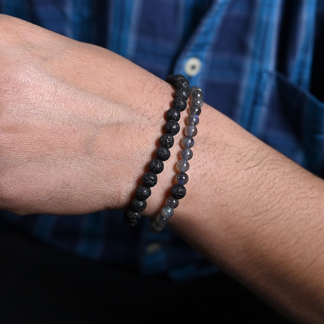 Elegant Labradorite and Lava gemstone bracelet gracefully adorning the wrist, blending fashion with healing energy.