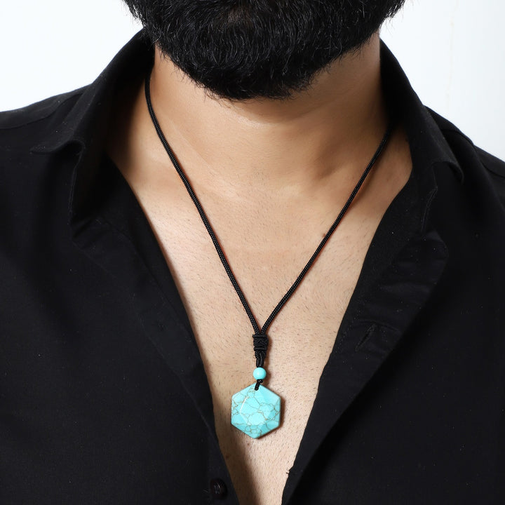 A visual representation of the weight of the pendant necklace, emphasizing its substantial yet comfortable feel on the neckline.