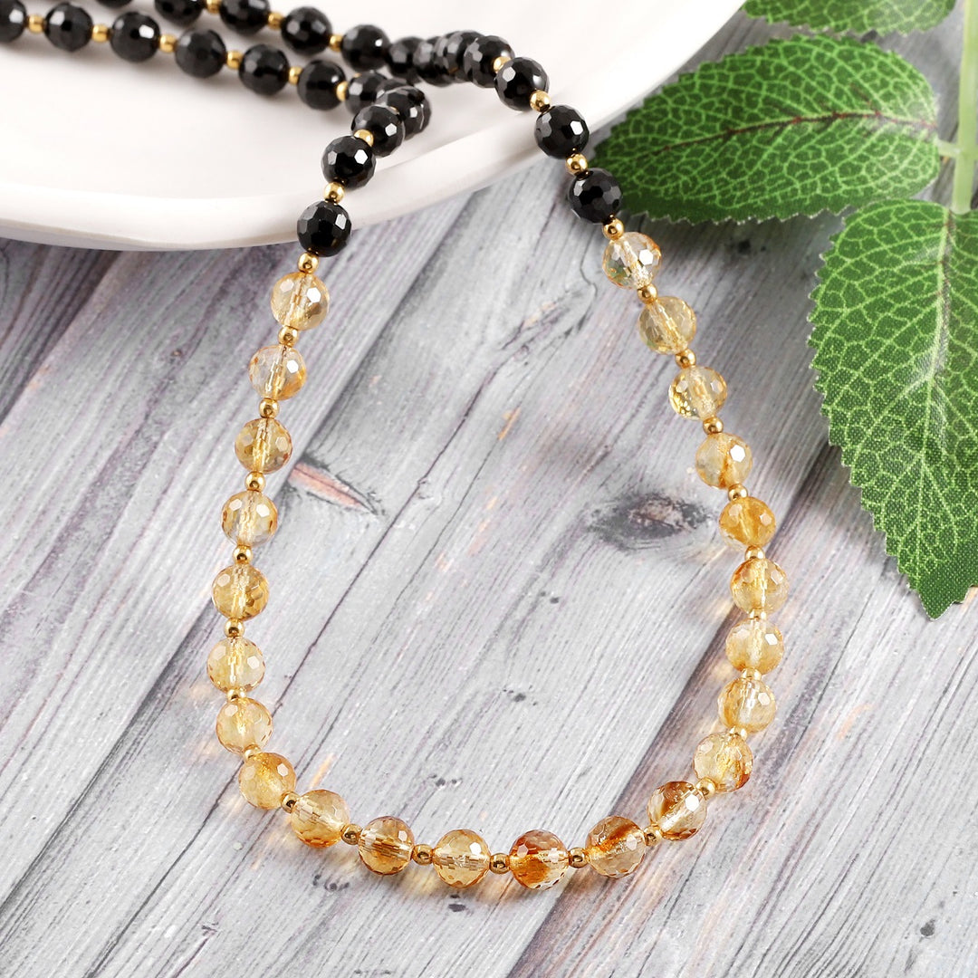 Close-up of Citrine Gemstone Beads and Black Spinel Beads on Necklace