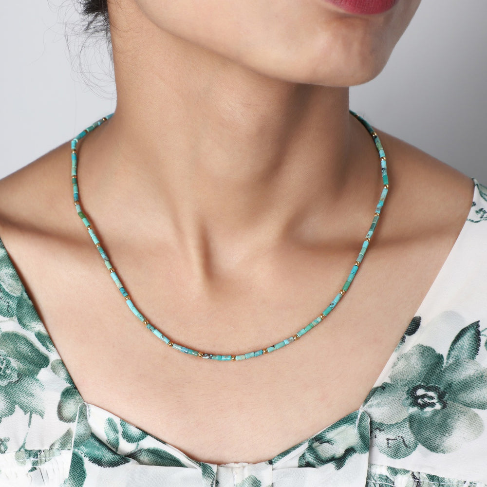 Stunning Natural Turquoise & Hematite Beads Necklace gracefully worn, showcasing its versatile style and elegance