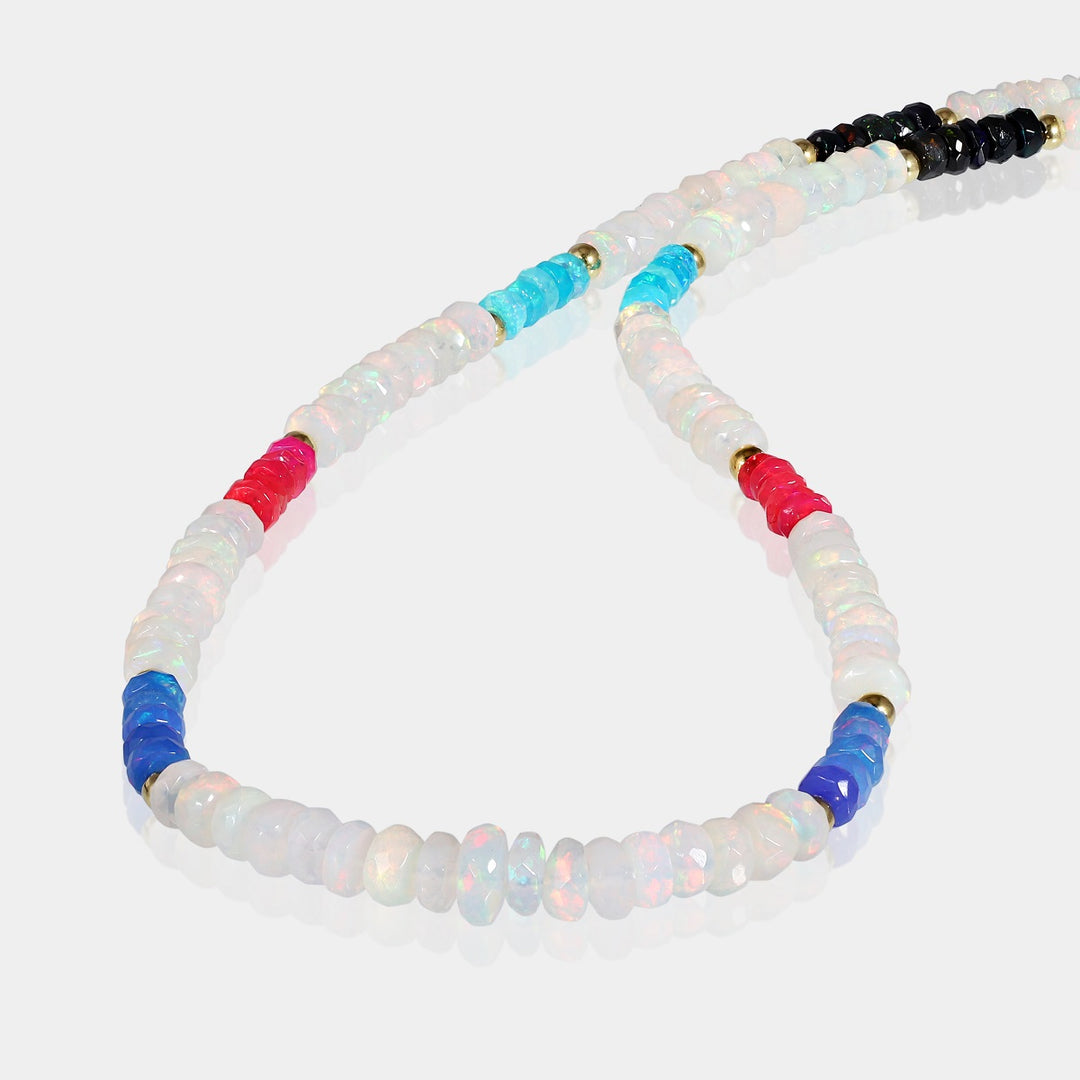 Close-up view of Ethiopian Opal Beads Necklace showcasing faceted rondelle beads in white, black, blue & pink hues