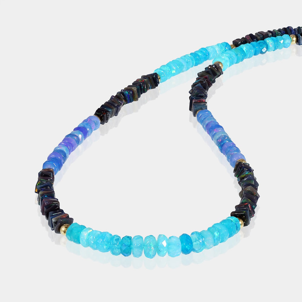 Gemstone Jewelry with Serene Blue and Deep Black Opals