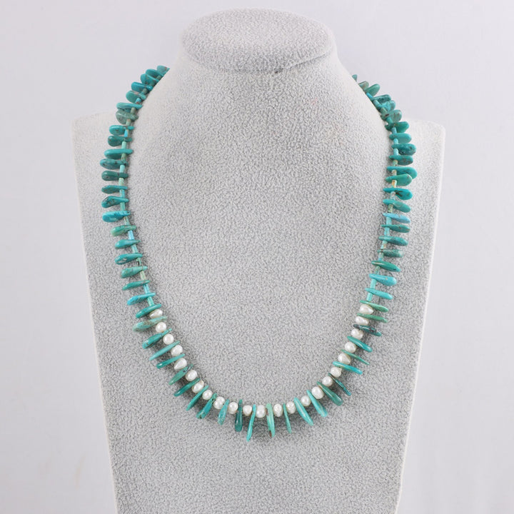 Turquoise and Pearl Silver Necklace on Display