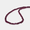 Purple Garnet beads promoting vitality and positive energy
