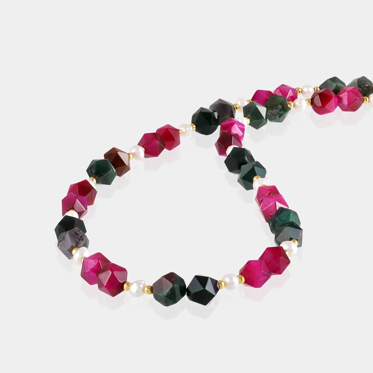 Close-up of Bloodstone and Pink Tiger's Eye Gemstone Beads