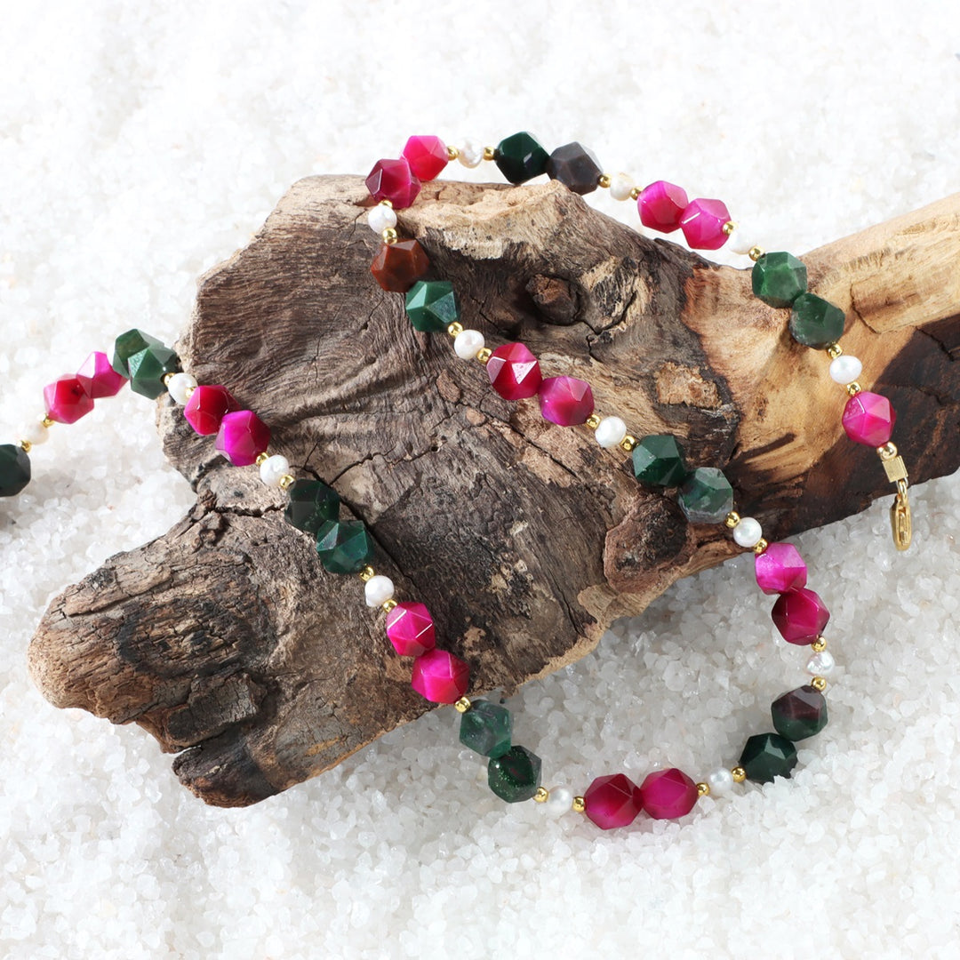 Close-up of Bloodstone, Pink Tiger's Eye and Pearl necklace