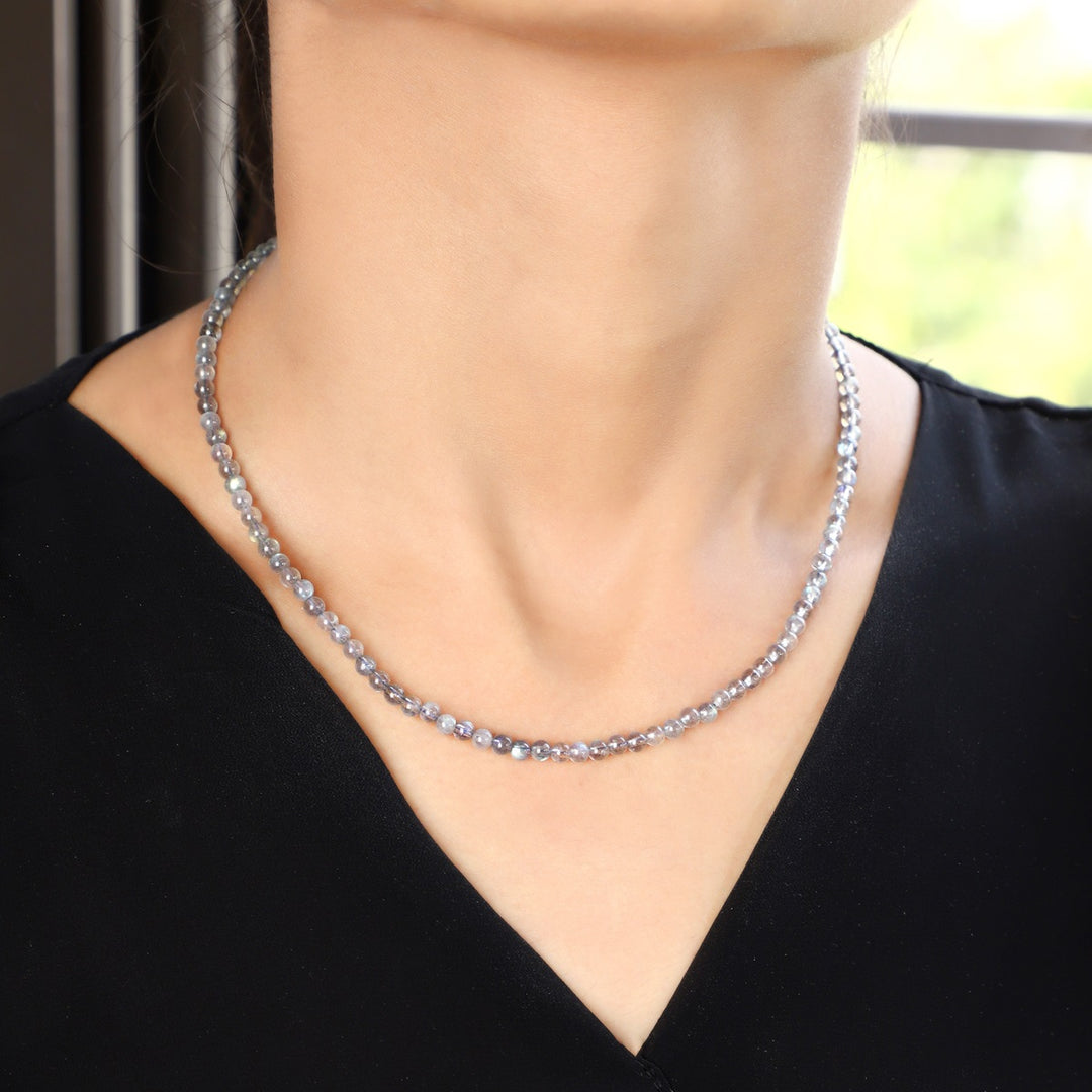 Elegantly styled model wearing the Labradorite Harmony Necklace, radiating timeless beauty and mystical charm