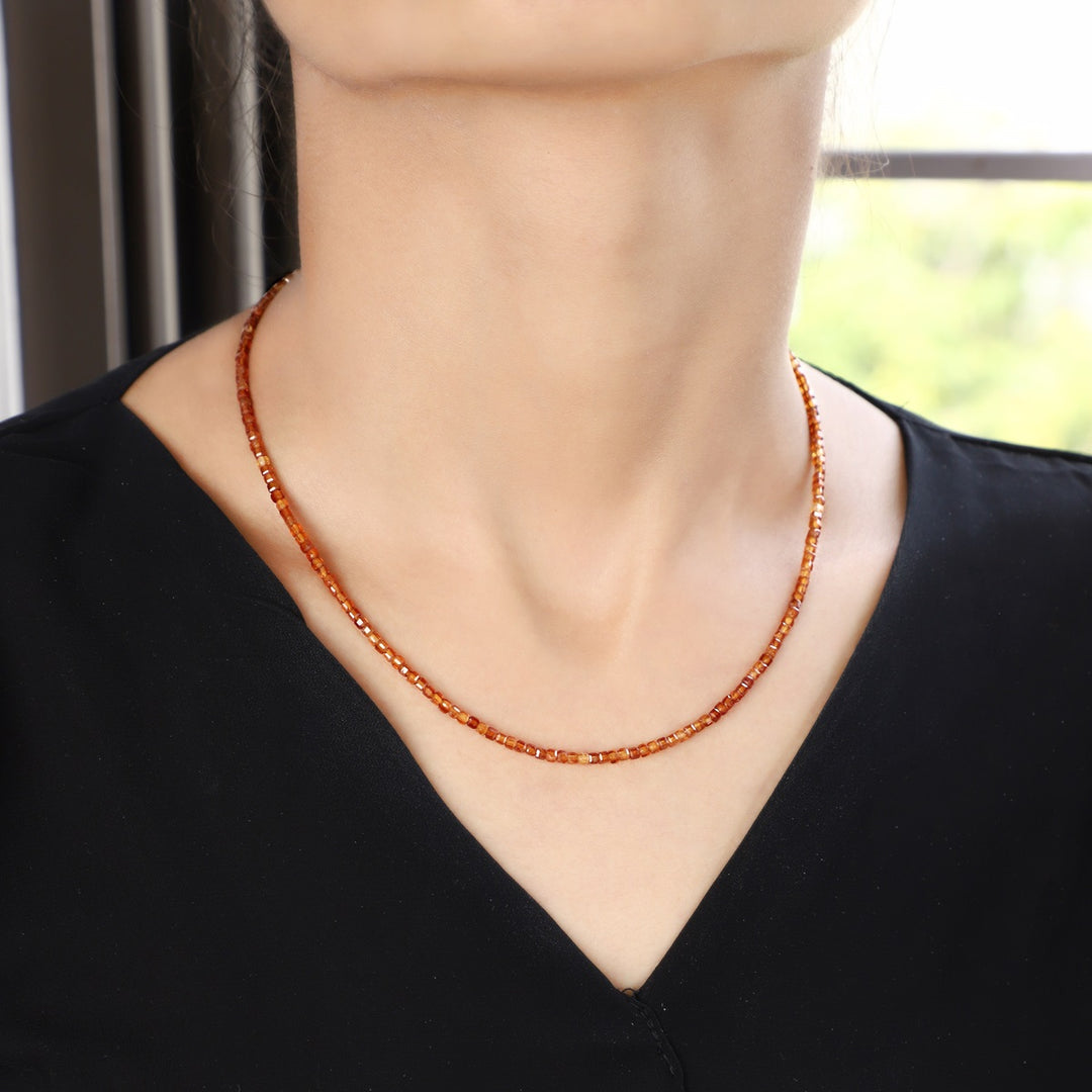 Model Wearing the Hessonite Cube Necklace