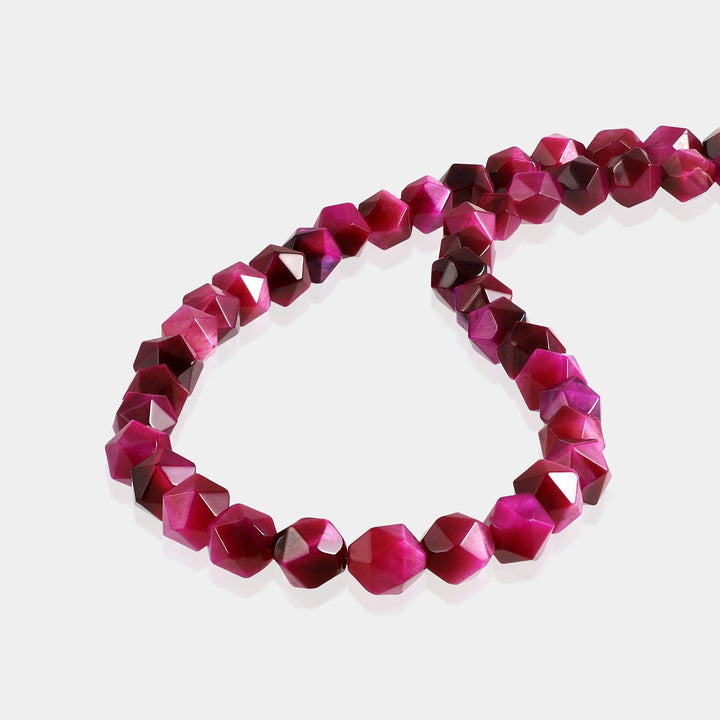 Close-up of Pink Tiger's Eye Star Beads