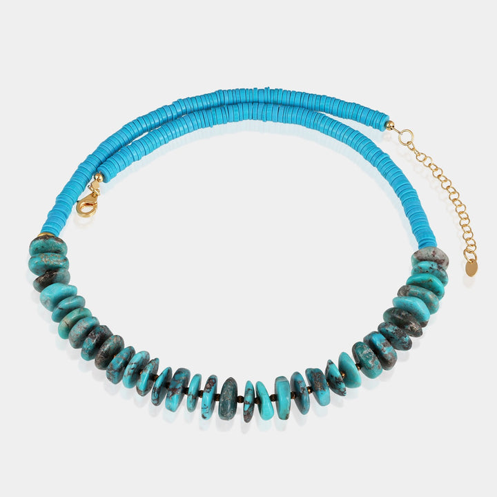 A stunning combination of copper and gold hematite beads and blue turquoise beads on a handmade 925 silver chain.