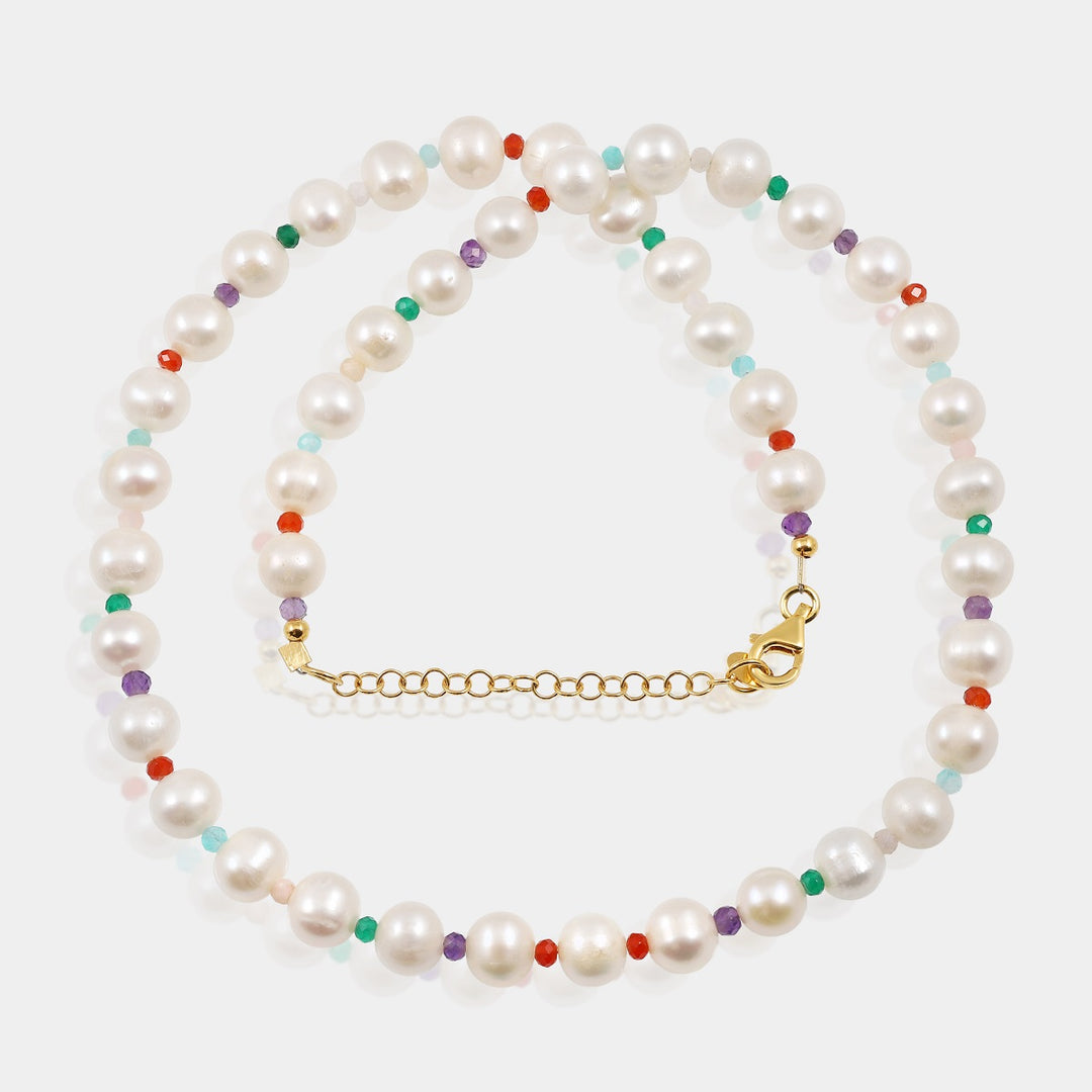 A stunning handmade 925 silver necklace featuring a combination of pearls, amethyst, pink opal, amazonite, green onyx, and red onyx gemstone beads.