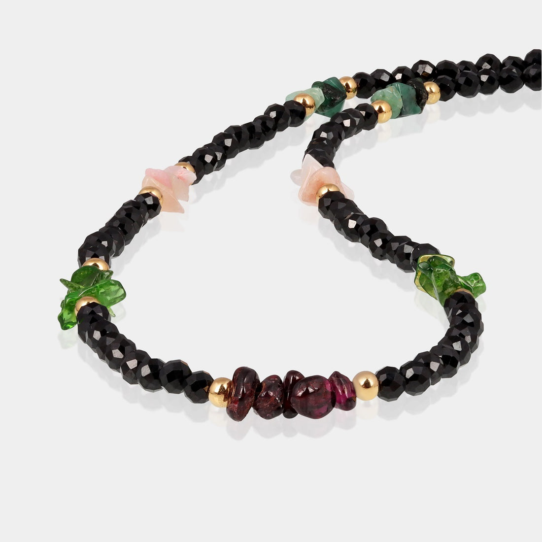 A stunning collection of gemstone beads in various colors and shapes, handcrafted in sterling silver.