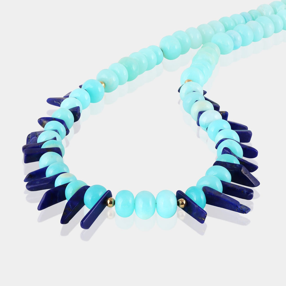 Smooth rondelle-shaped opal gemstone beads in mesmerizing aqua blue color