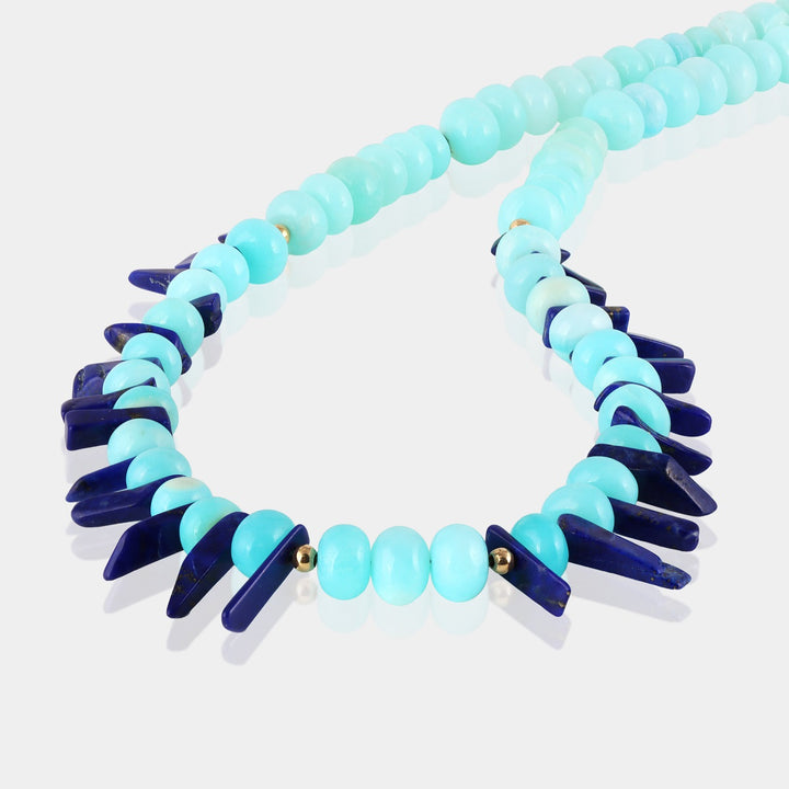 Smooth rondelle-shaped opal gemstone beads in mesmerizing aqua blue color