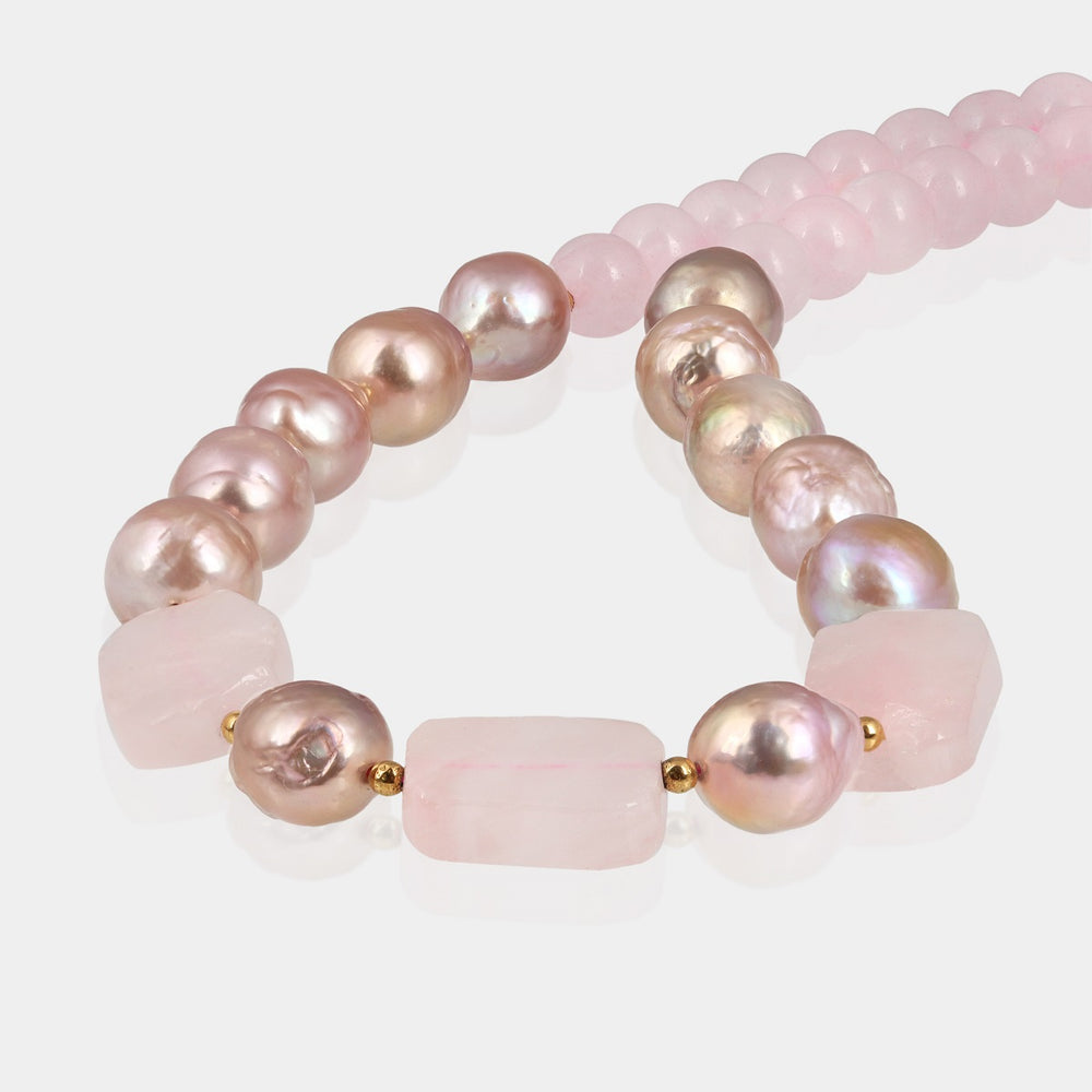 Lustrous pink pearl beads in smooth potato shape