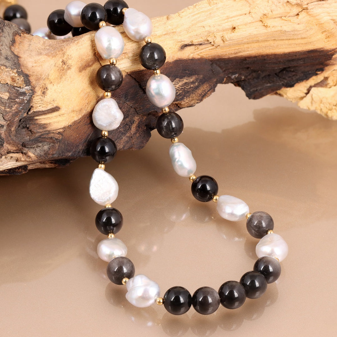 Smooth tumble-shaped multicolor pearl beads.