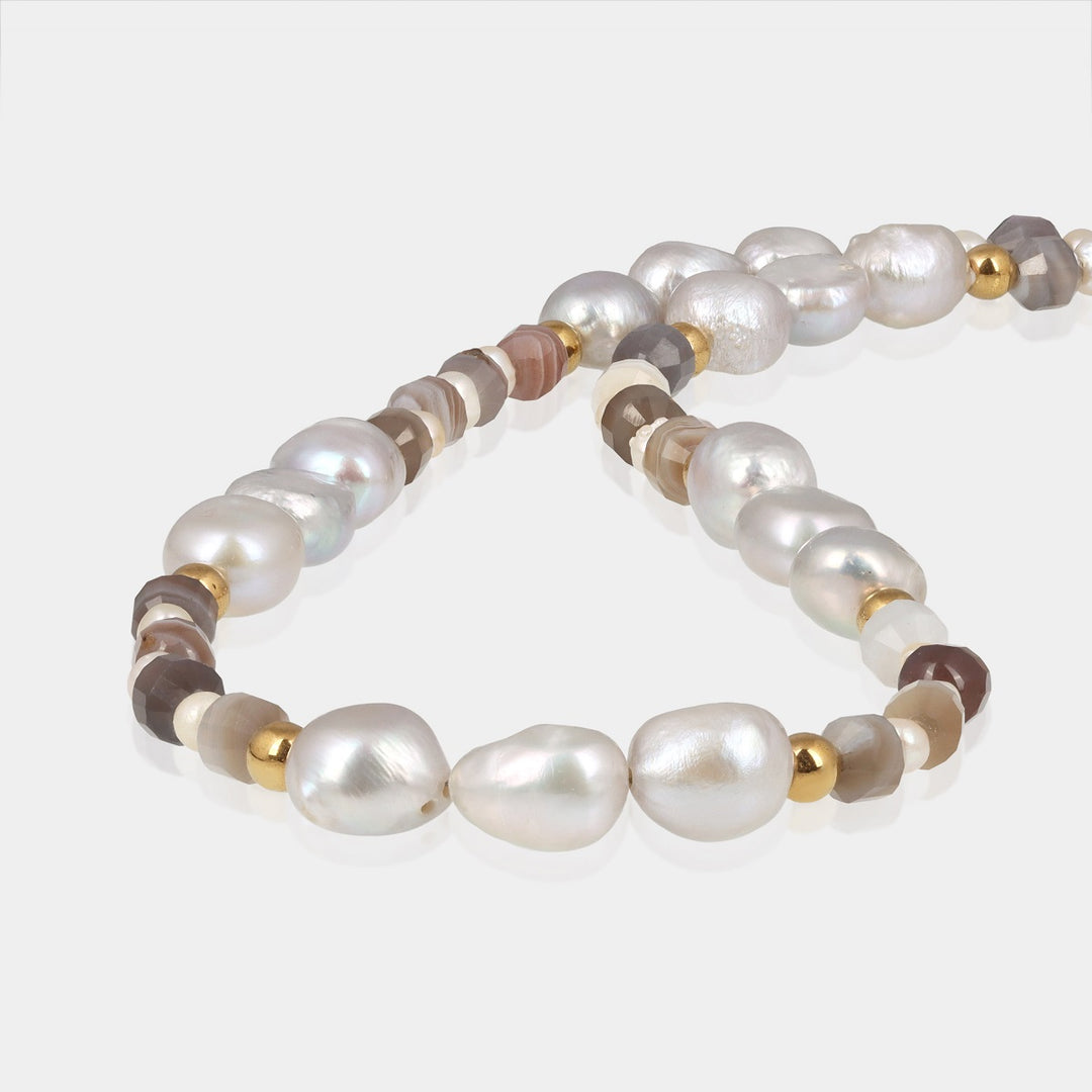 Smooth potato and tumble-shaped white and gray pearl beads