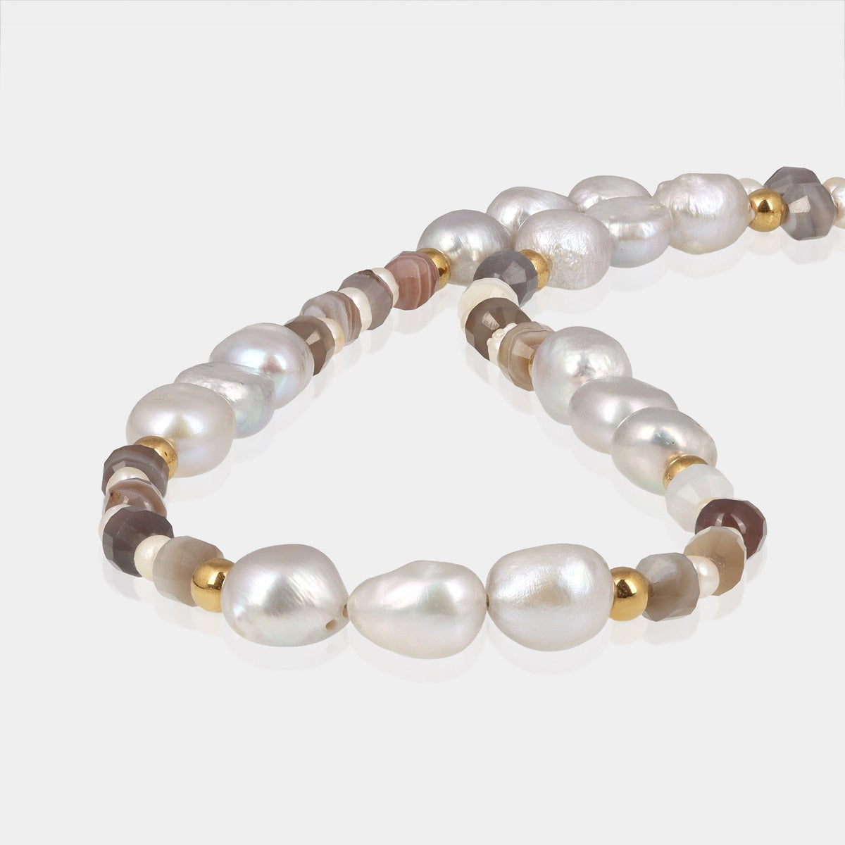 Smooth potato and tumble-shaped white and gray pearl beads