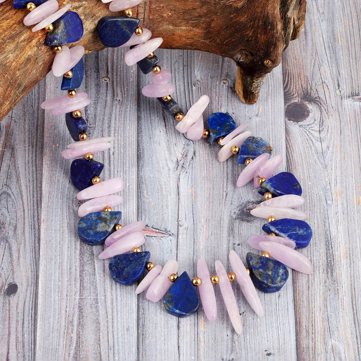 Smooth pear-shaped lapis lazuli gemstone beads in blue color