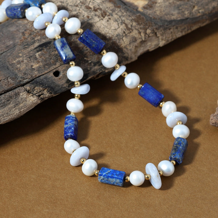 Regal blue Lapis Lazuli gemstone in smooth tube shape, exuding sophistication