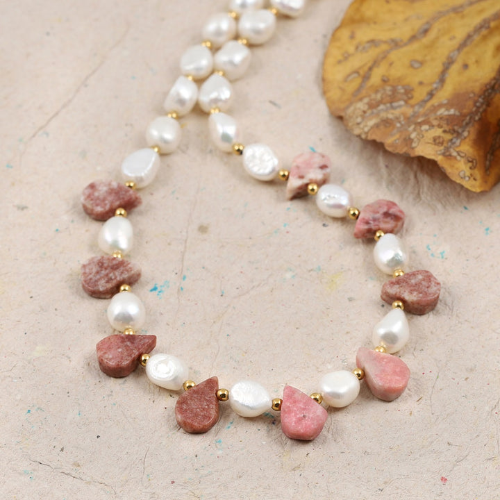 Smooth tumble-shaped pearl gemstone beads in elegant white color