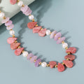 Soft pink smooth nugget-shaped Kunzite gemstone beads on silver necklace