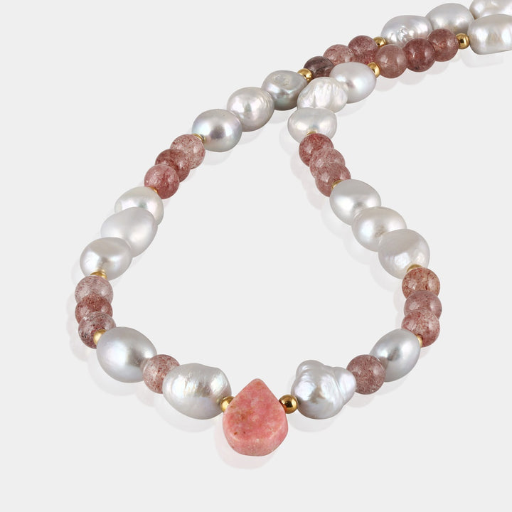 Smooth tumble-shaped multicolor pearl gemstone beads.