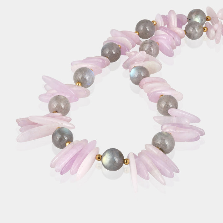 Smooth nugget-shaped kunzite gemstone beads in pink color