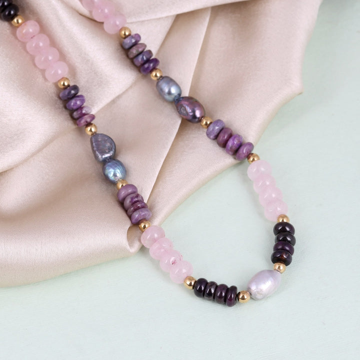 mooth rondelle-shaped Rose Quartz and Sugilite gemstone beads on silver necklace