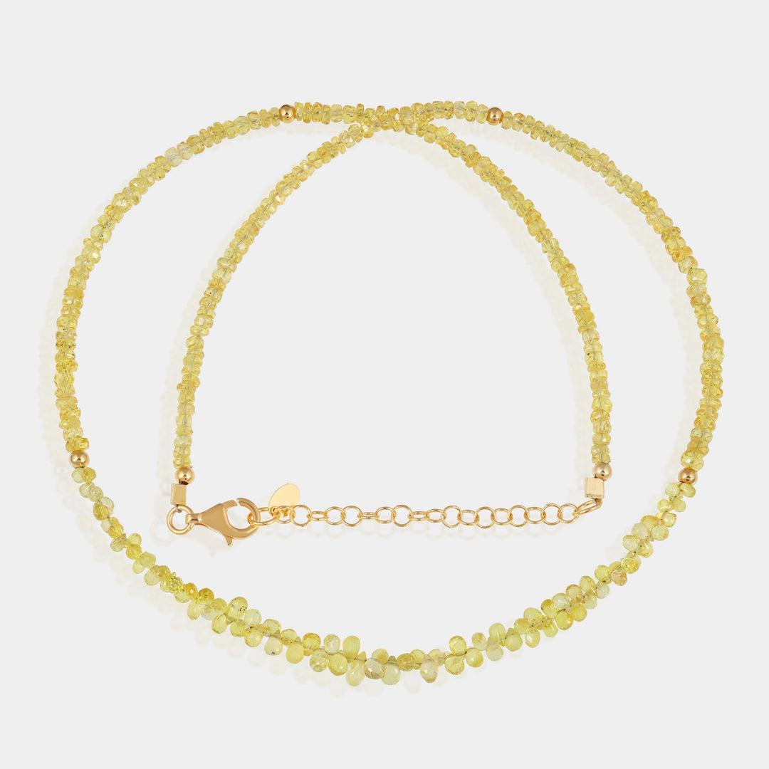 Dangling drop-shaped Yellow Sapphire gemstone bead on silver necklace