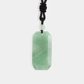 A stunning green aventurine gemstone with a smooth surface, radiating a calming and vibrant green hue.