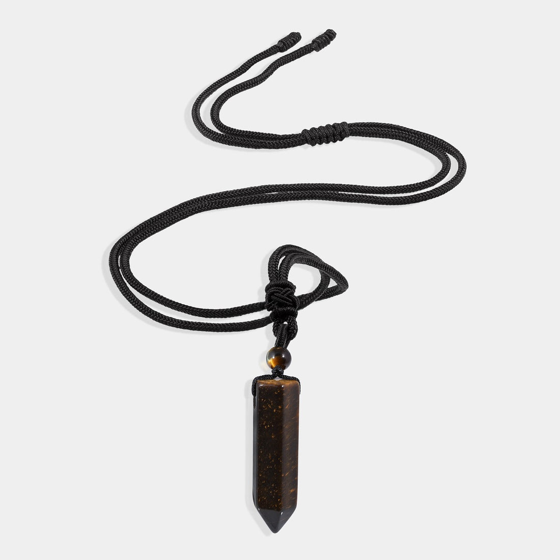 A detailed view of the artistic and intricate wrapping design that surrounds the Tiger's Eye gemstone, adding a touch of elegance to the pendant necklace.