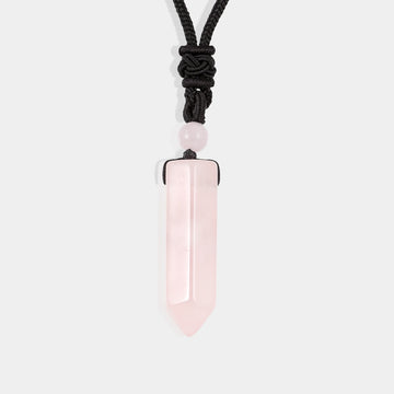 A smooth pendulum-cut rose quartz gemstone, measuring 16 x 36 mm, showcasing its captivating pink color and gentle energy.