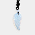 Exquisite carved wing pendant made of Ethiopian Opal