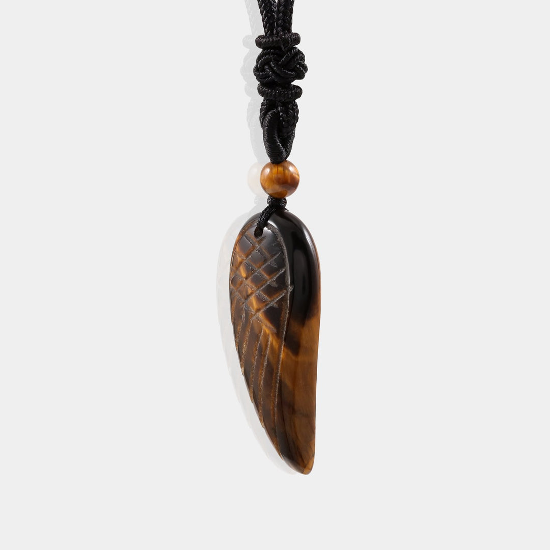 Smooth round Tiger's Eye gemstone showcasing mesmerizing golden-brown hues